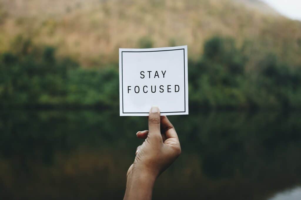 Stay focused text in nature inspirational motivation and advice concept
